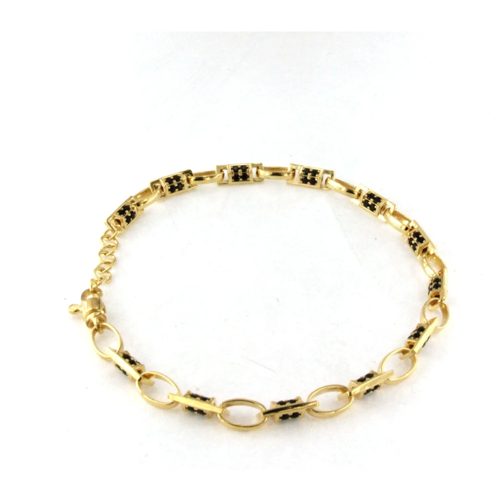 Bracciale in Argento giallo con pietre nere