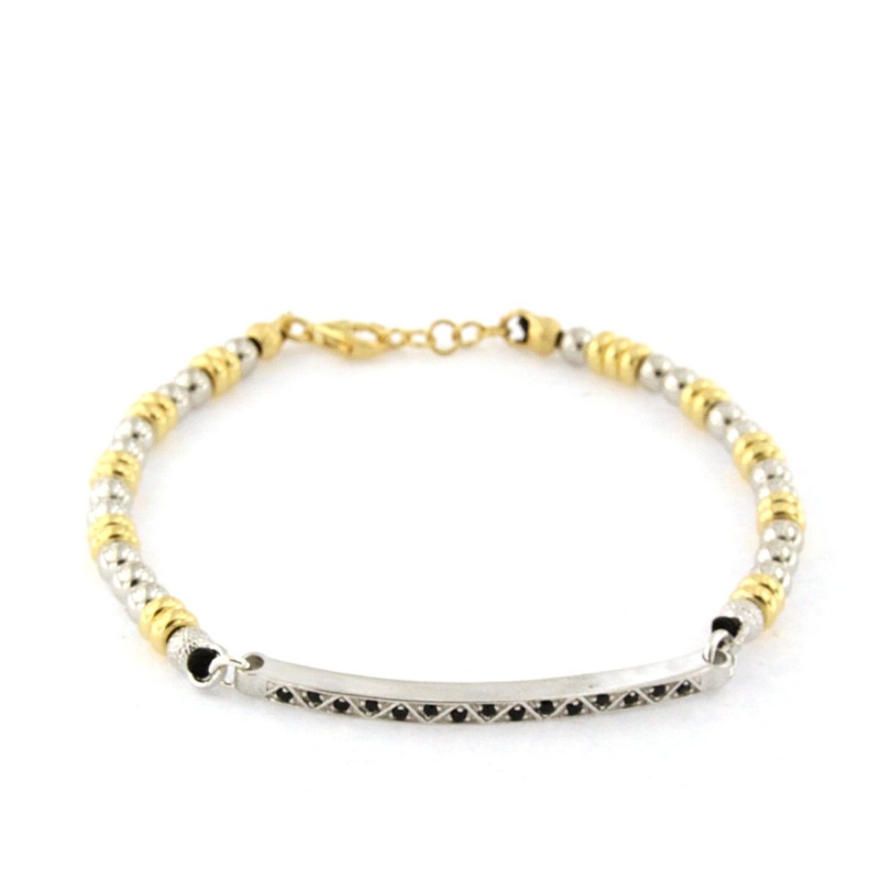 bracciale in argento con sfere bianche dettagli in argento giallo e pietre